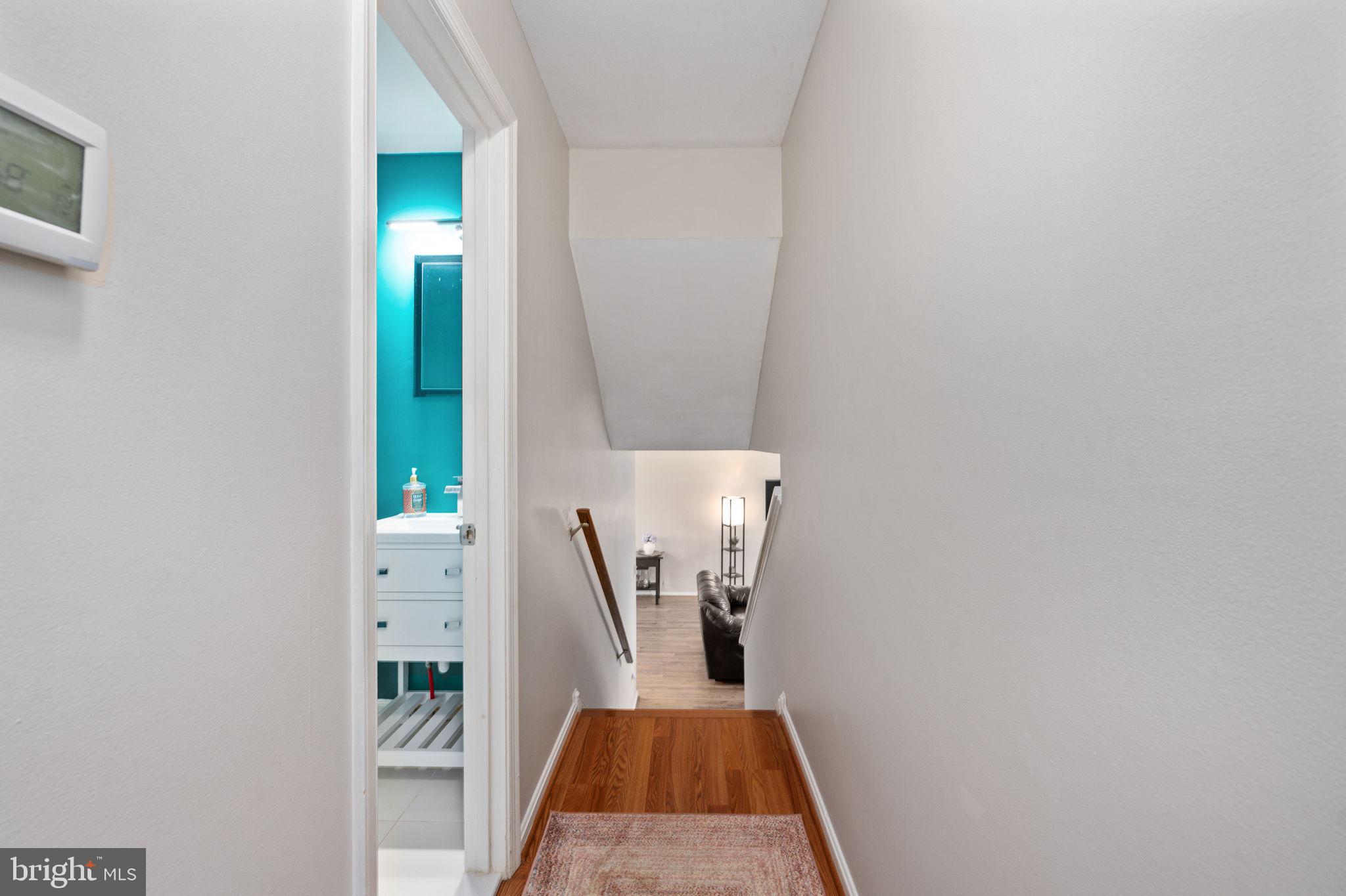6765 Settlers Ridge Road Warrenton, VA 20187 - Photo 35 of 66 a view of a hallway with seating area