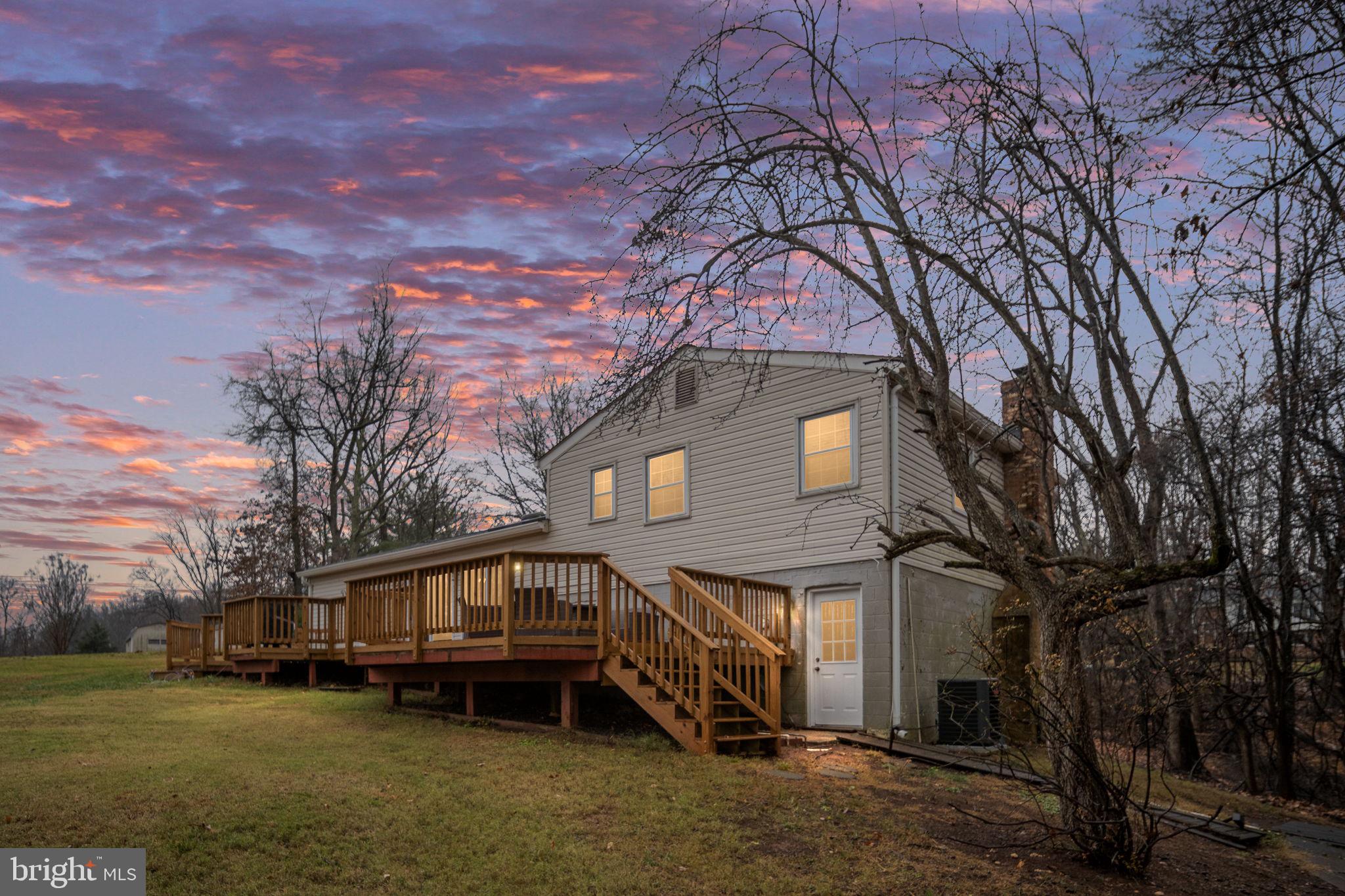 6765 Settlers Ridge Road Warrenton, VA 20187 - Photo 4 of 66 a house view with a yard space
