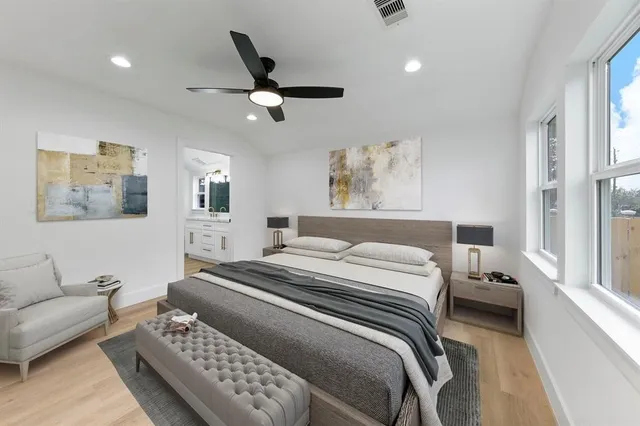 a view of an empty room and wooden floor