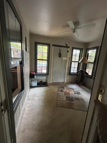 a house view with a backyard space