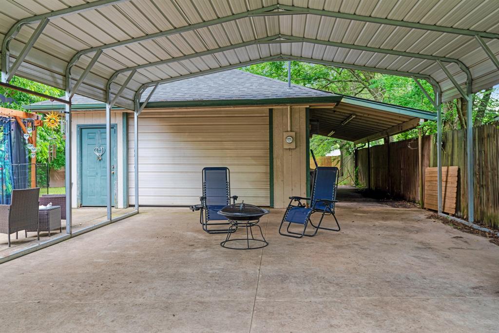 2275 Graham Street Paris, TX 75460 - Photo 3 of 21 View of RV parking, carport, lean to for extra parking, & workshop