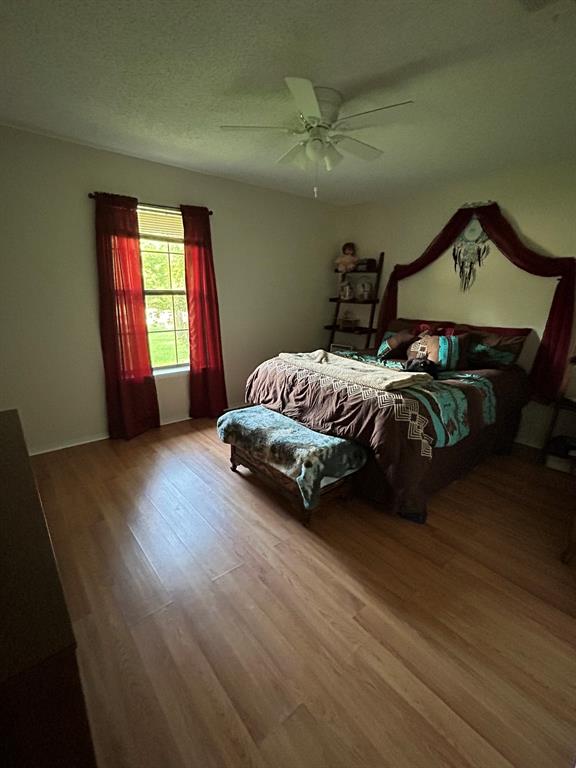 2275 Graham Street Paris, TX 75460 - Photo 9 of 21 Another angle of primary bedroom.