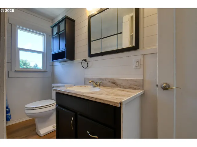 a bathroom with a sink and a toilet