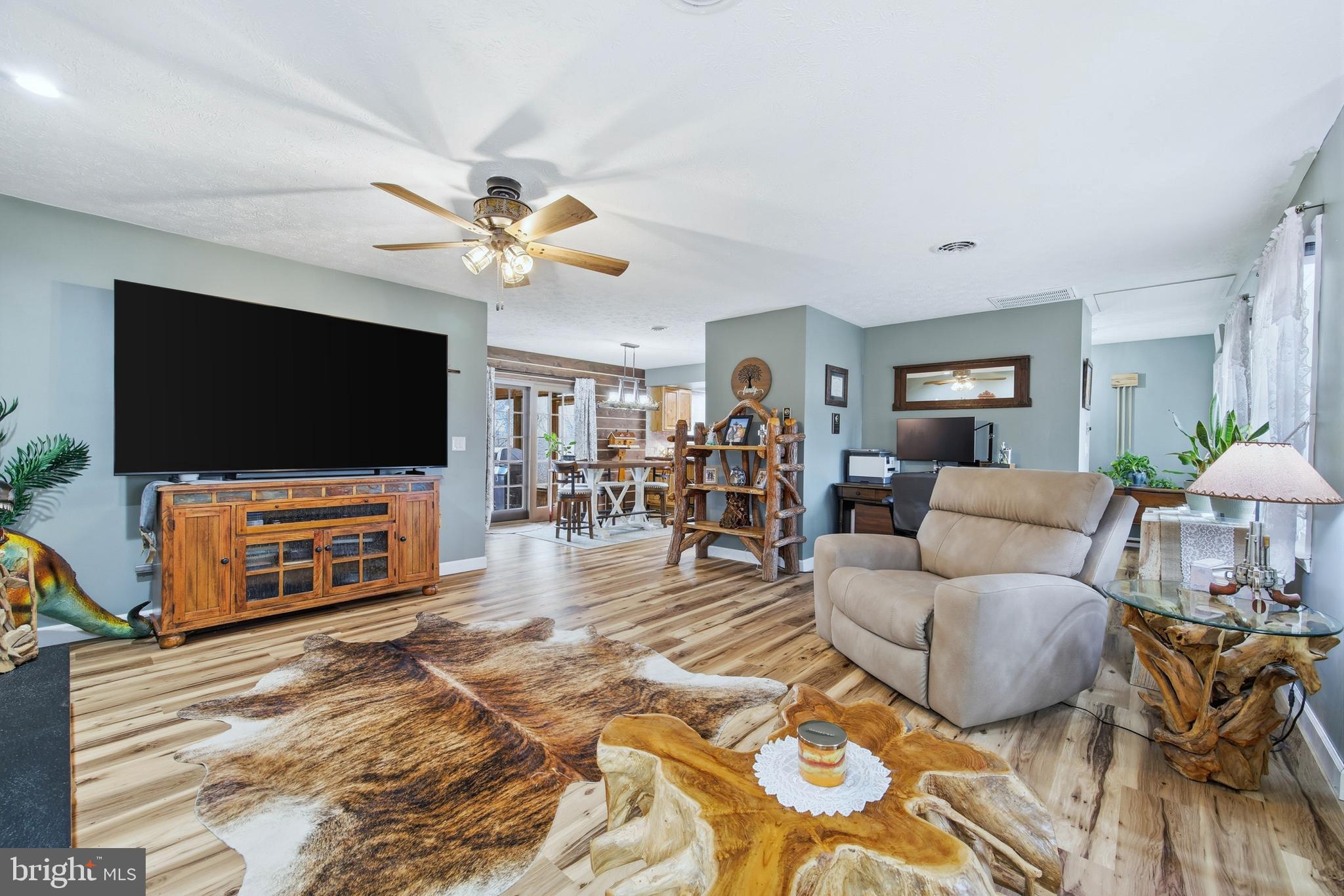 5911 Smith Creek Road New Market, VA 22844 - Photo 13 of 78 a living room with furniture and a flat screen tv
