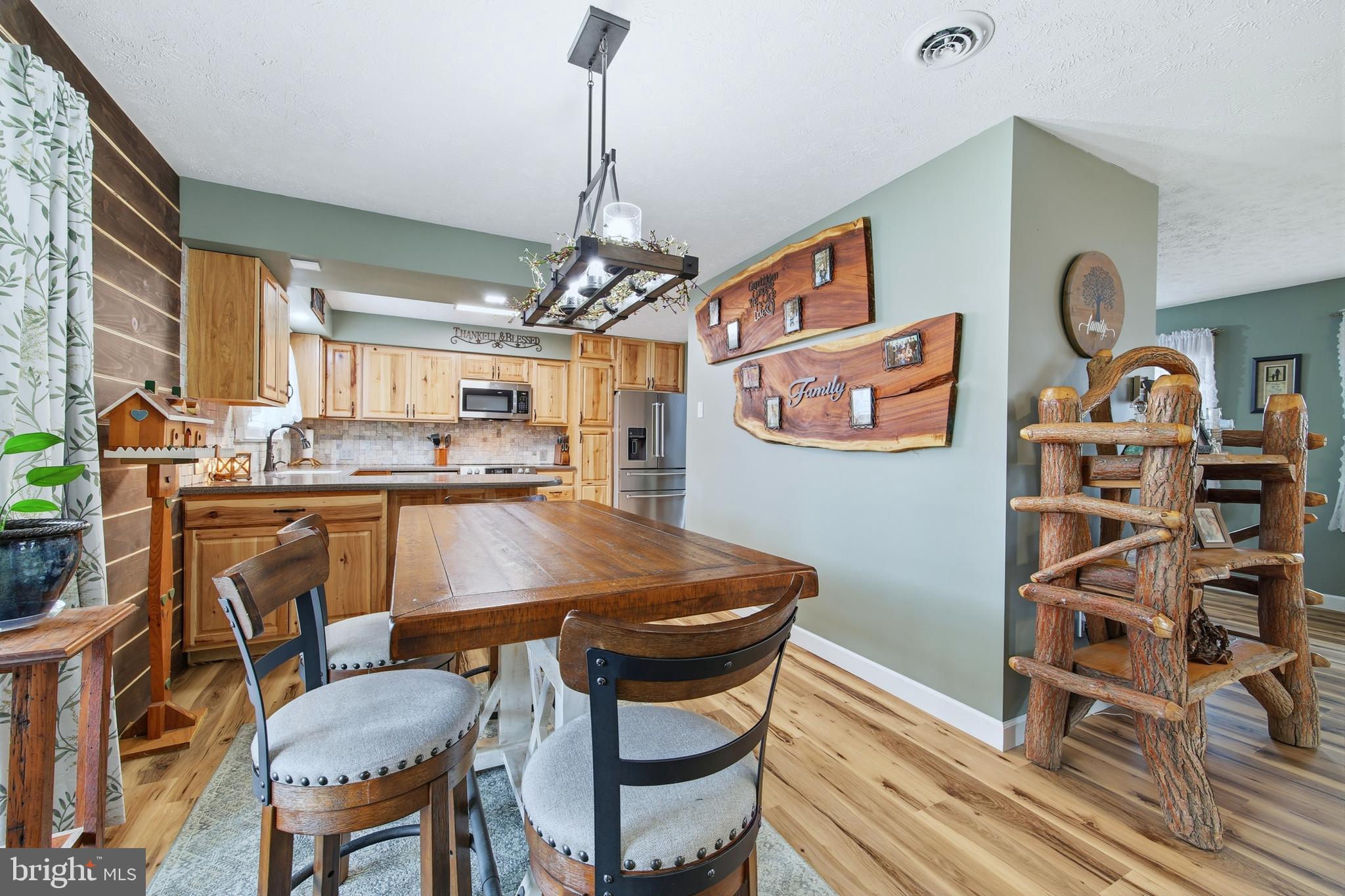 5911 Smith Creek Road New Market, VA 22844 - Photo 22 of 78 a dining room with furniture and window