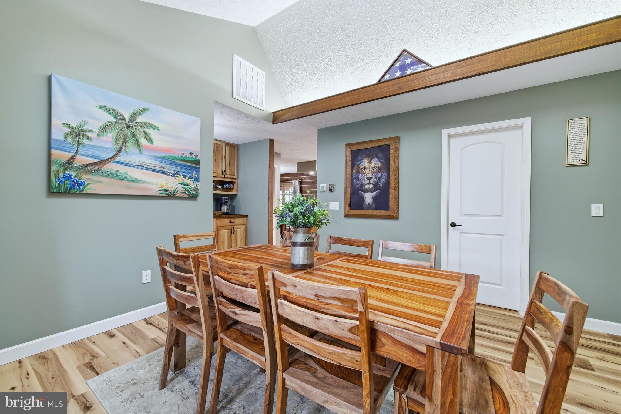 5911 Smith Creek Road New Market, VA 22844 - Photo 31 of 78 a view of a dining room with furniture and wooden floor