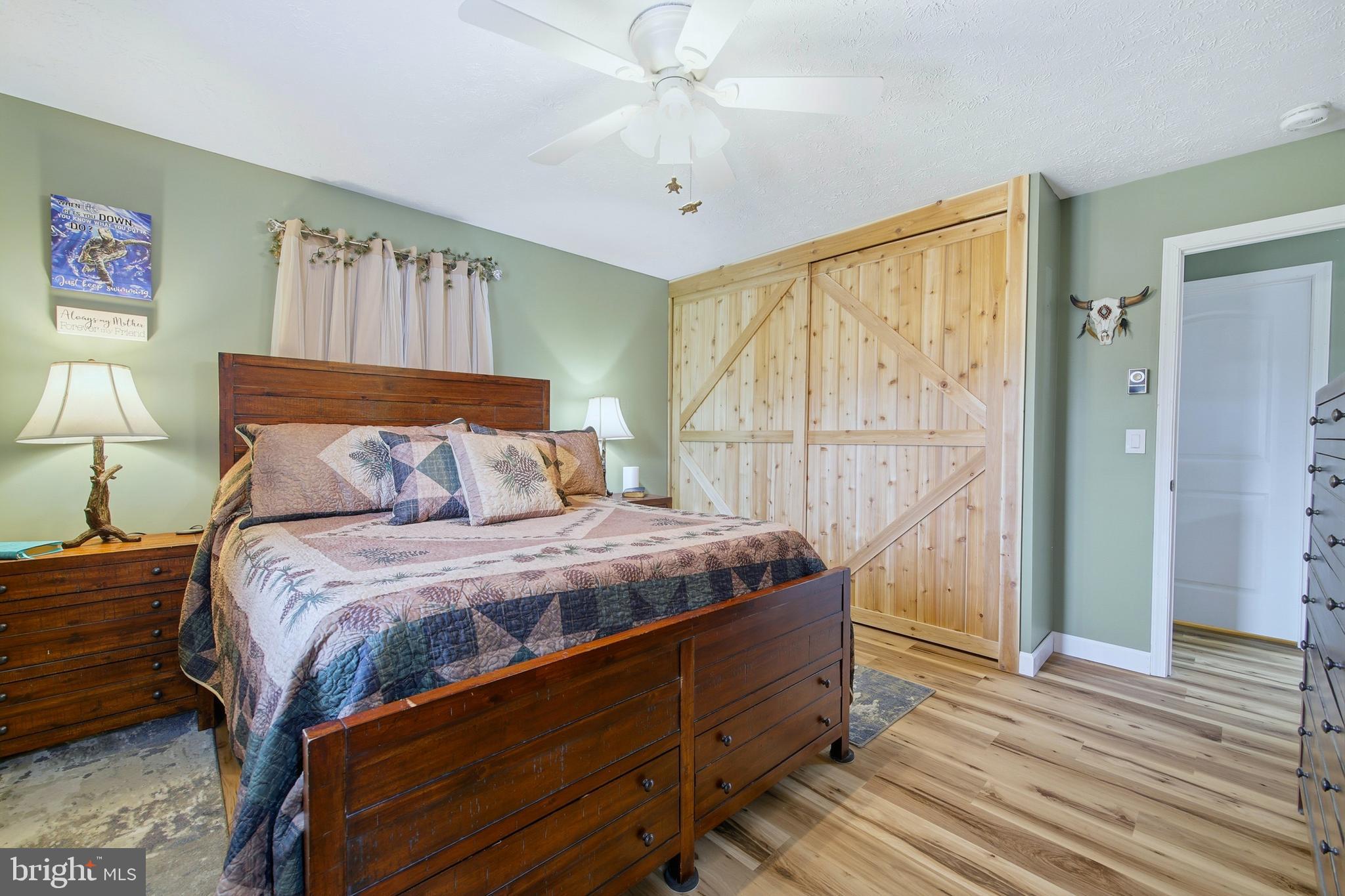 5911 Smith Creek Road New Market, VA 22844 - Photo 37 of 78 a bedroom with a bed and a window