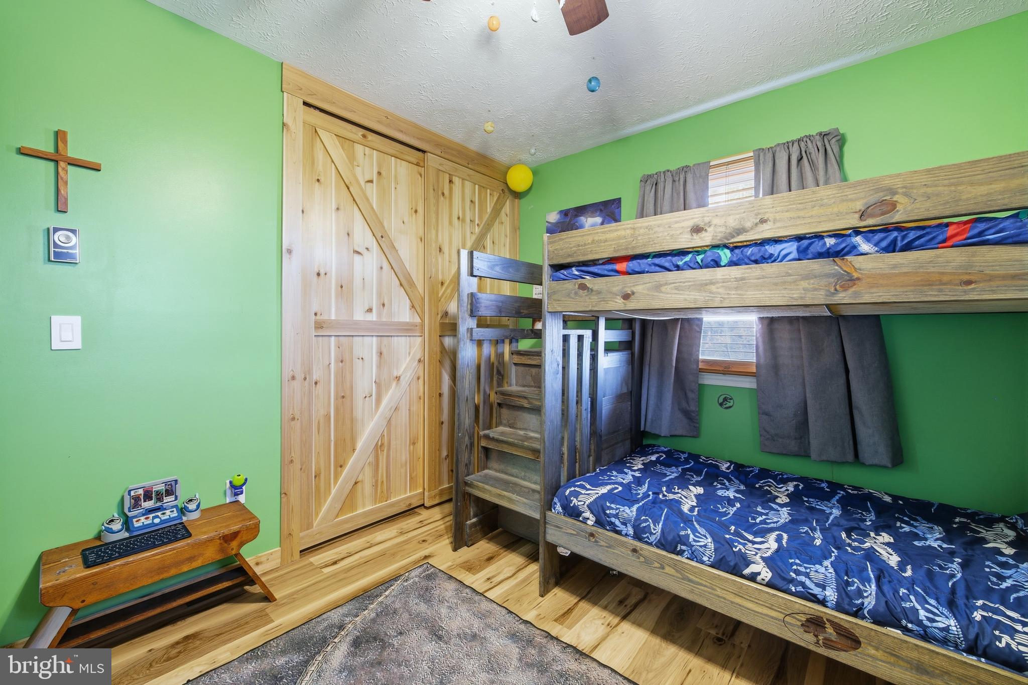 5911 Smith Creek Road New Market, VA 22844 - Photo 43 of 78 a bed room with a bed and a window