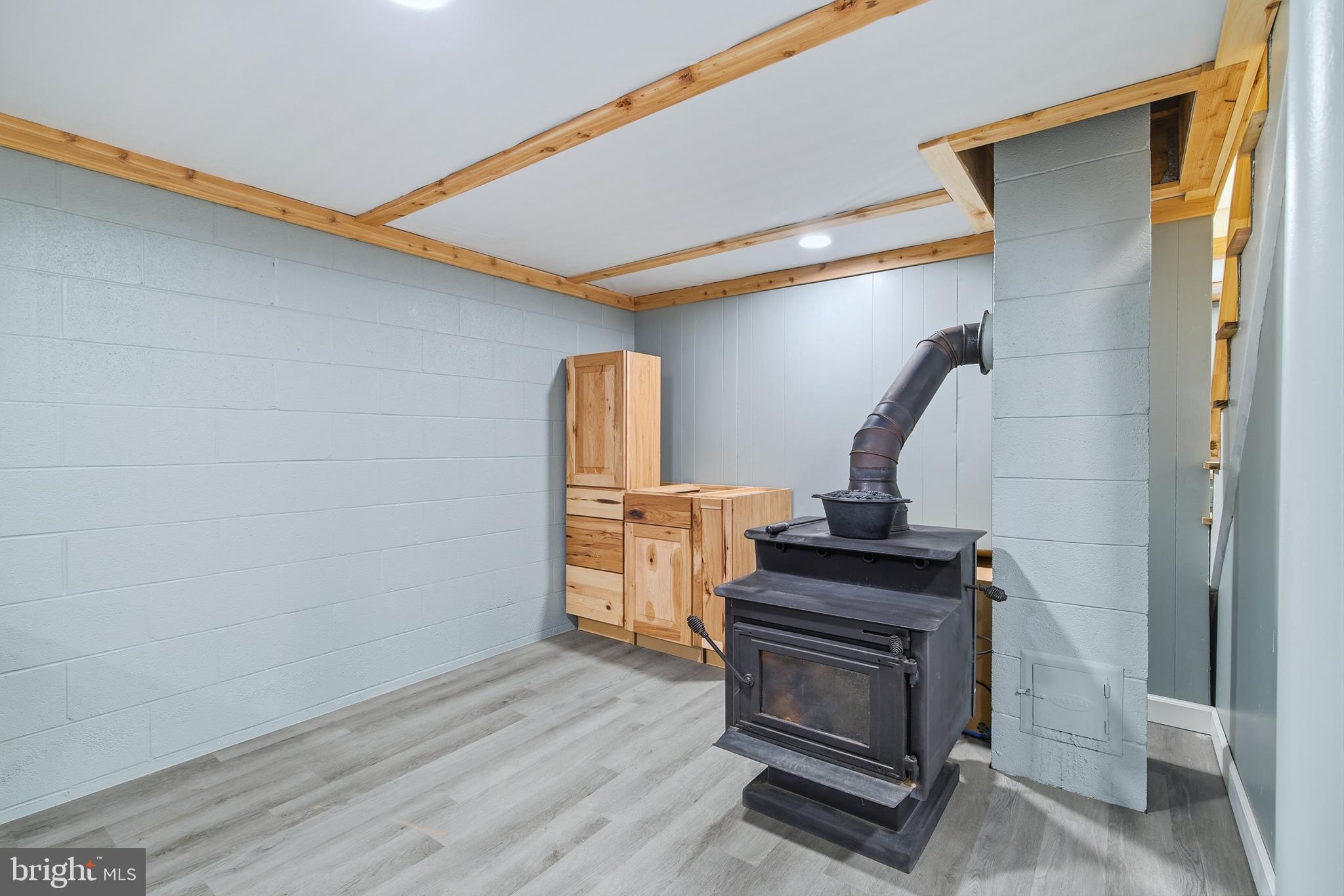 5911 Smith Creek Road New Market, VA 22844 - Photo 48 of 78 a view of a hallway with wooden floor and staircase