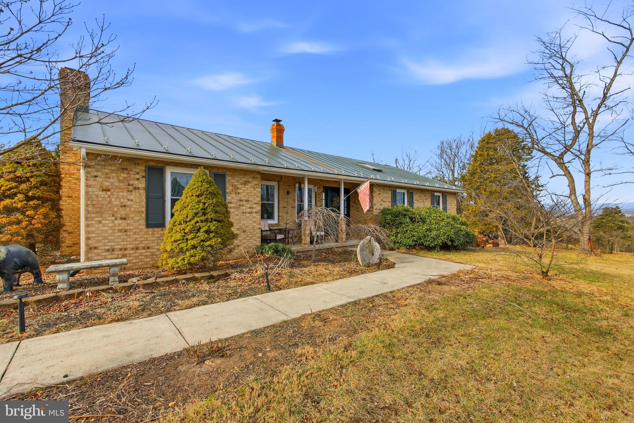 5911 Smith Creek Road New Market, VA 22844 - Photo 71 of 78 a front view of a house with garden