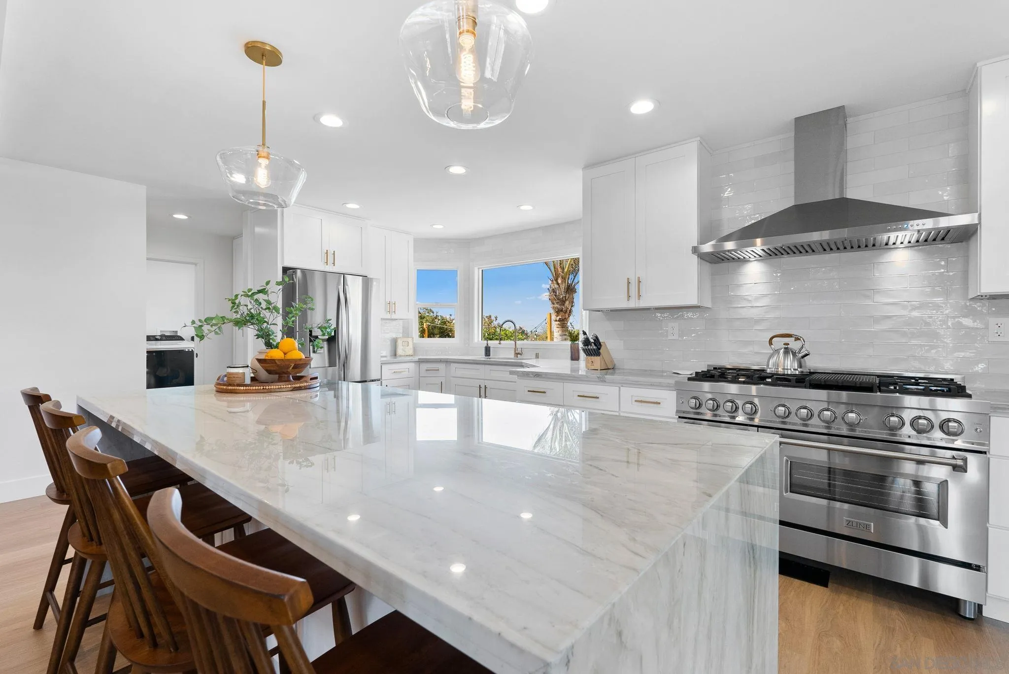 3168 Alta Verde Drive Fallbrook, CA 92028 - Photo 11 of 67 a kitchen with stainless steel appliances granite countertop a stove a refrigerator a kitchen island a sink and a stove