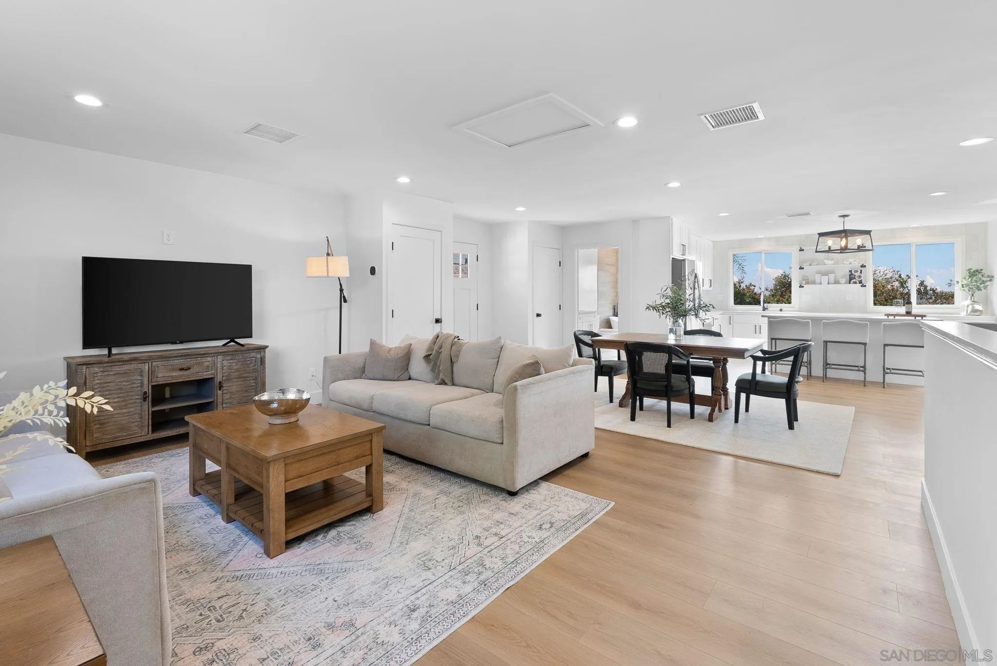 3168 Alta Verde Drive Fallbrook, CA 92028 - Photo 33 of 67 a living room with furniture and a flat screen tv