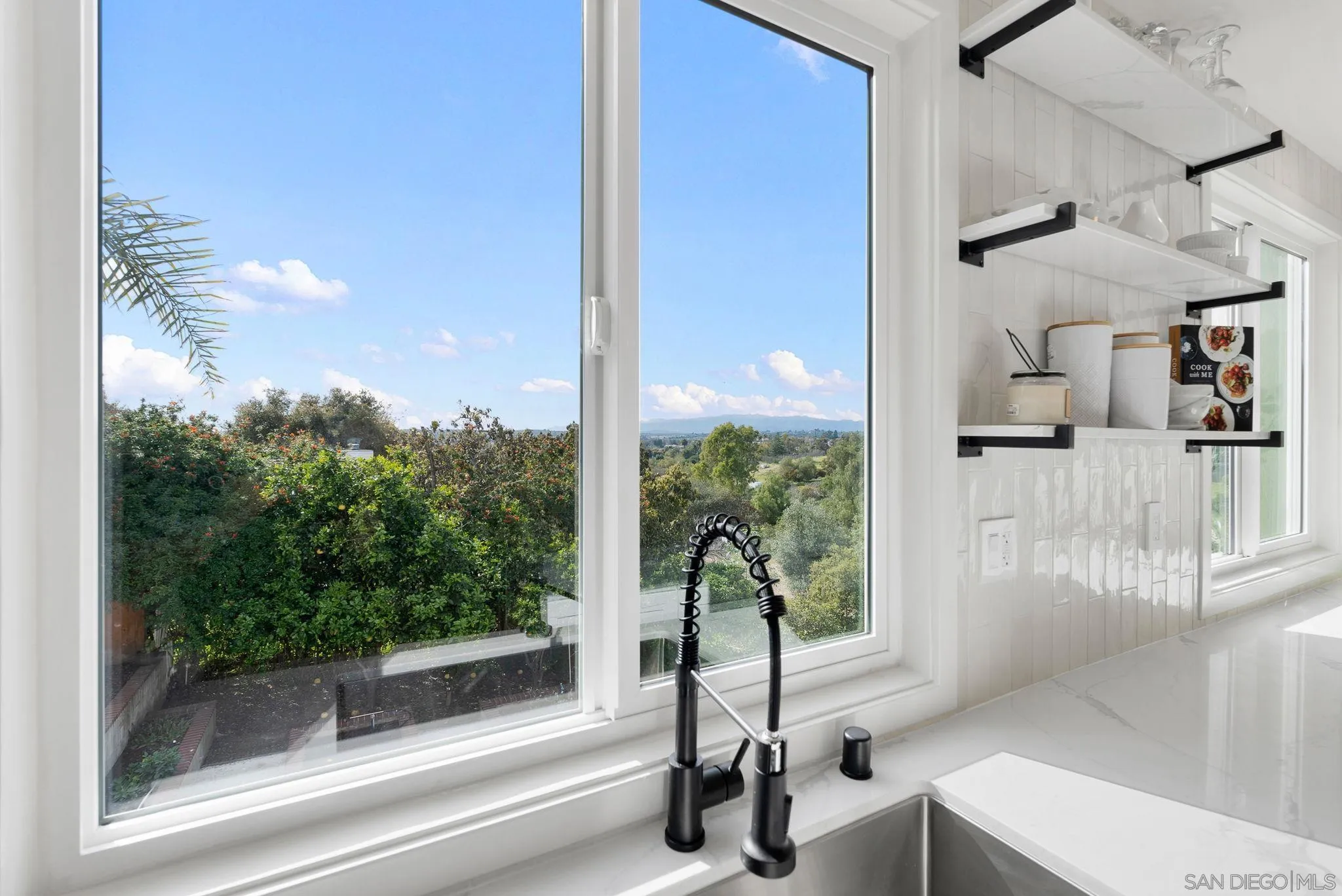3168 Alta Verde Drive Fallbrook, CA 92028 - Photo 35 of 67 a view of a living room and a balcony