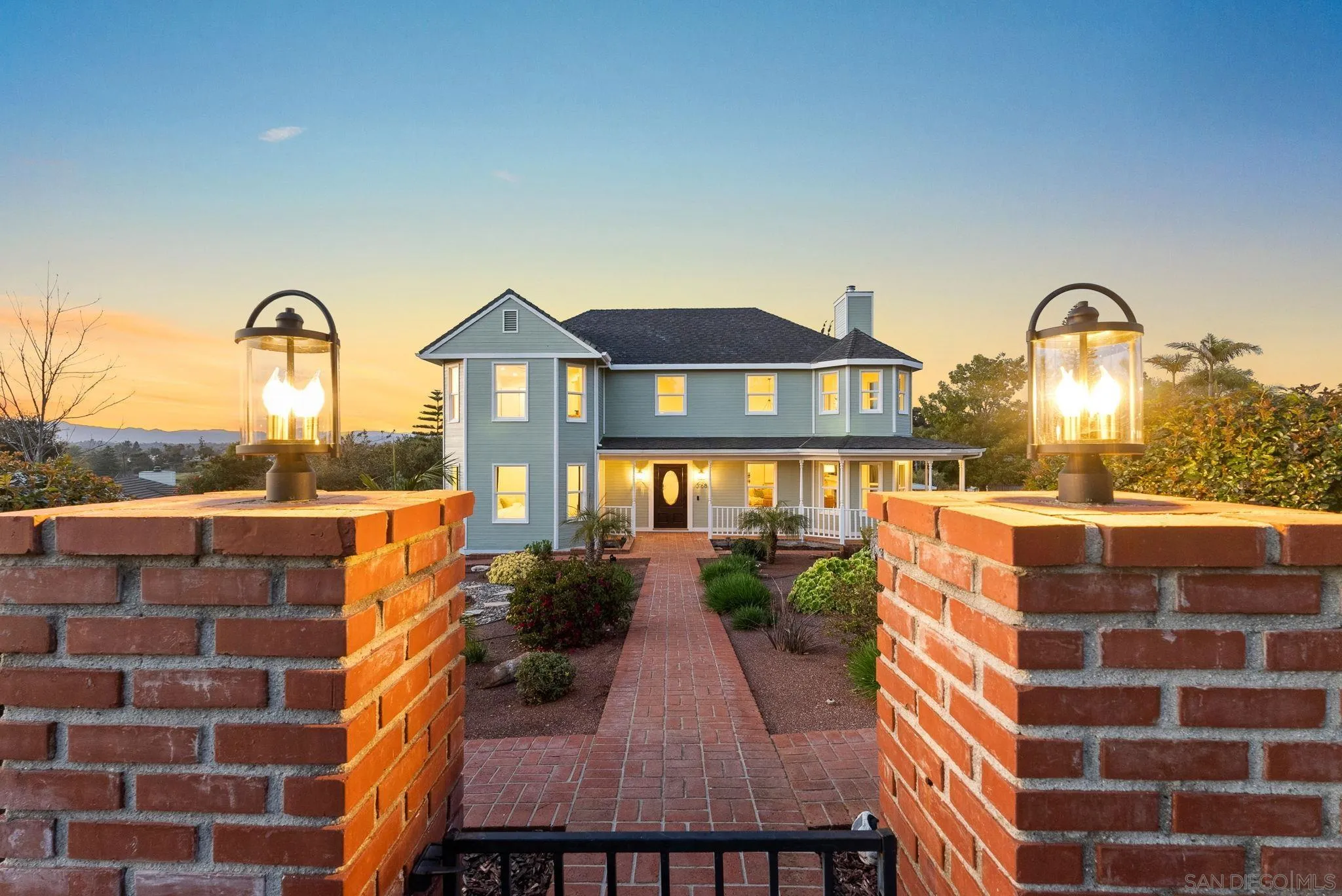 3168 Alta Verde Drive Fallbrook, CA 92028 - Photo 42 of 67 a front view of a house with a yard
