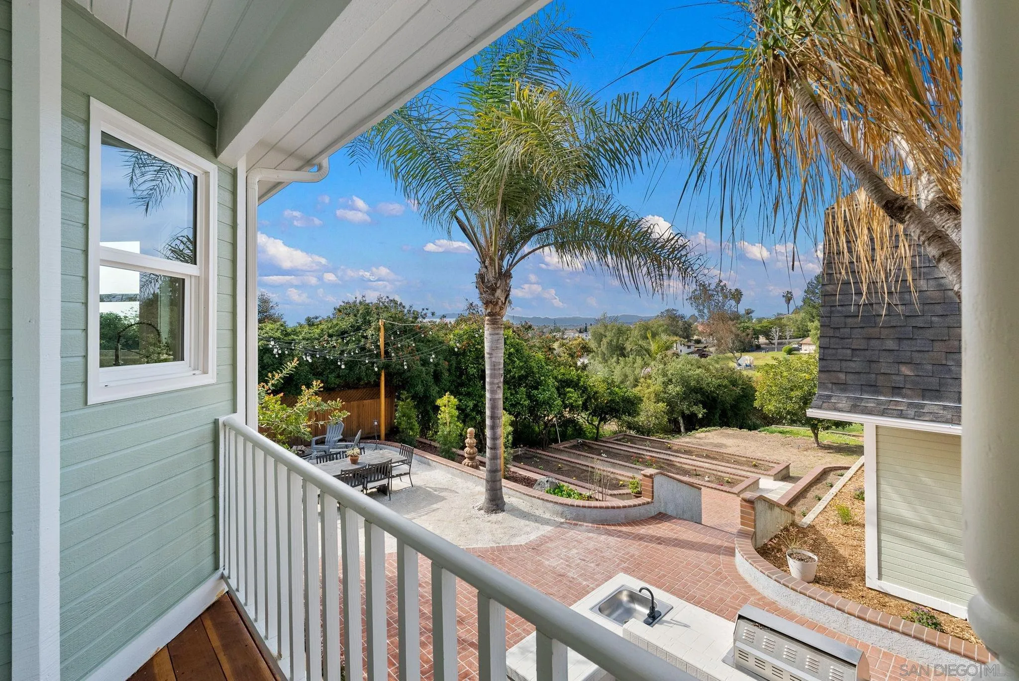 3168 Alta Verde Drive Fallbrook, CA 92028 - Photo 49 of 67 a view of a chair and table in the balcony