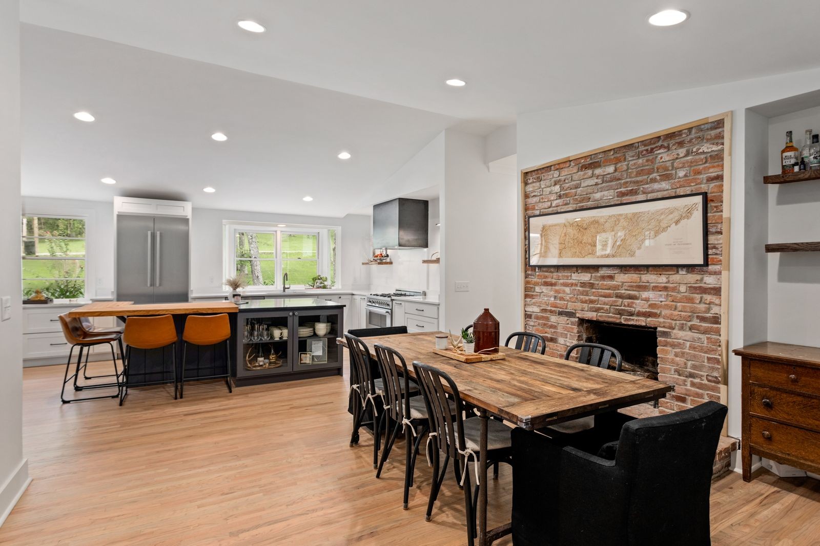 6437 Bresslyn Road Nashville, TN 37205 - Photo 14 of 47 a view of a dining room with furniture window and wooden floor