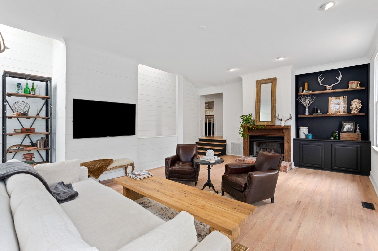6437 Bresslyn Road Nashville, TN 37205 - Photo 16 of 47 a living room with furniture and a flat screen tv