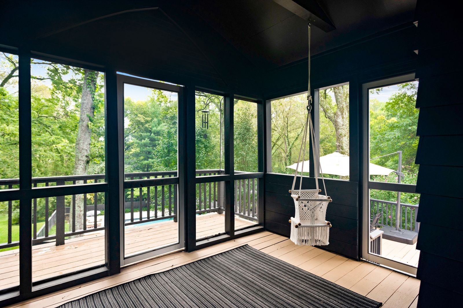 6437 Bresslyn Road Nashville, TN 37205 - Photo 17 of 47 a view of a room with wooden floor and outdoor space
