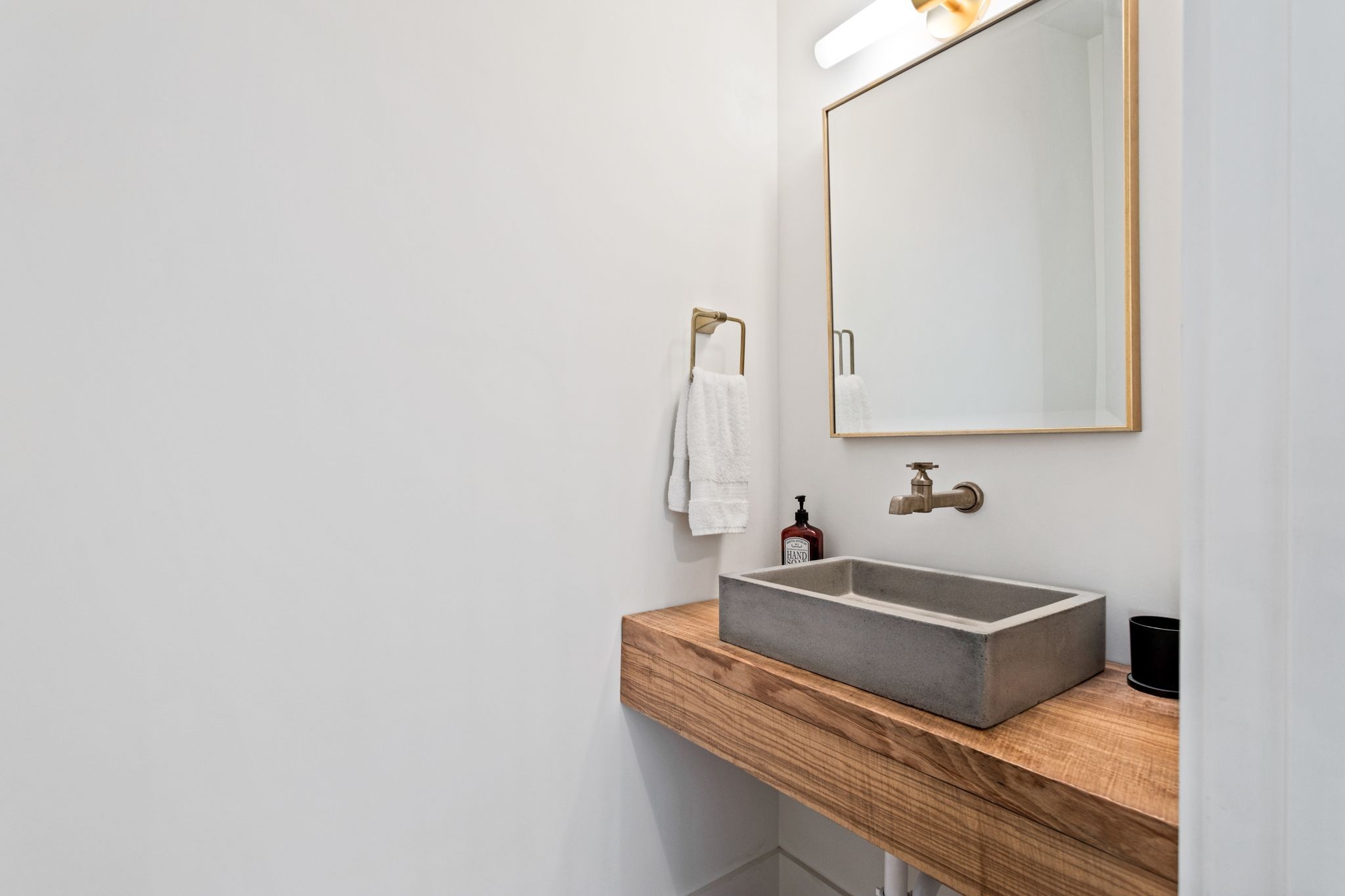 6437 Bresslyn Road Nashville, TN 37205 - Photo 18 of 47 a bathroom with a sink and a mirror