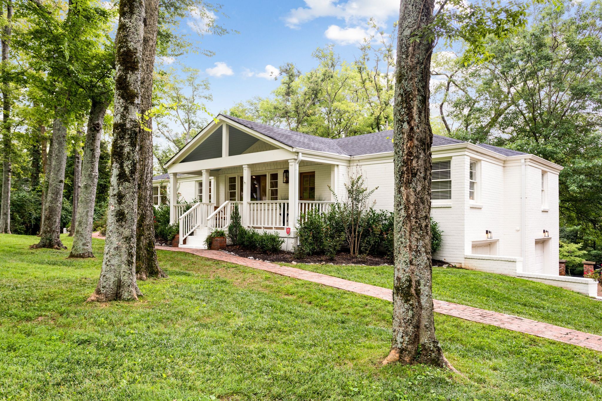 6437 Bresslyn Road Nashville, TN 37205 - Photo 3 of 47 a front view of house with yard and green space