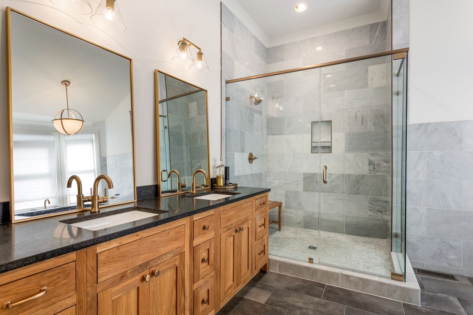 6437 Bresslyn Road Nashville, TN 37205 - Photo 21 of 47 a bathroom with a shower sink and mirror