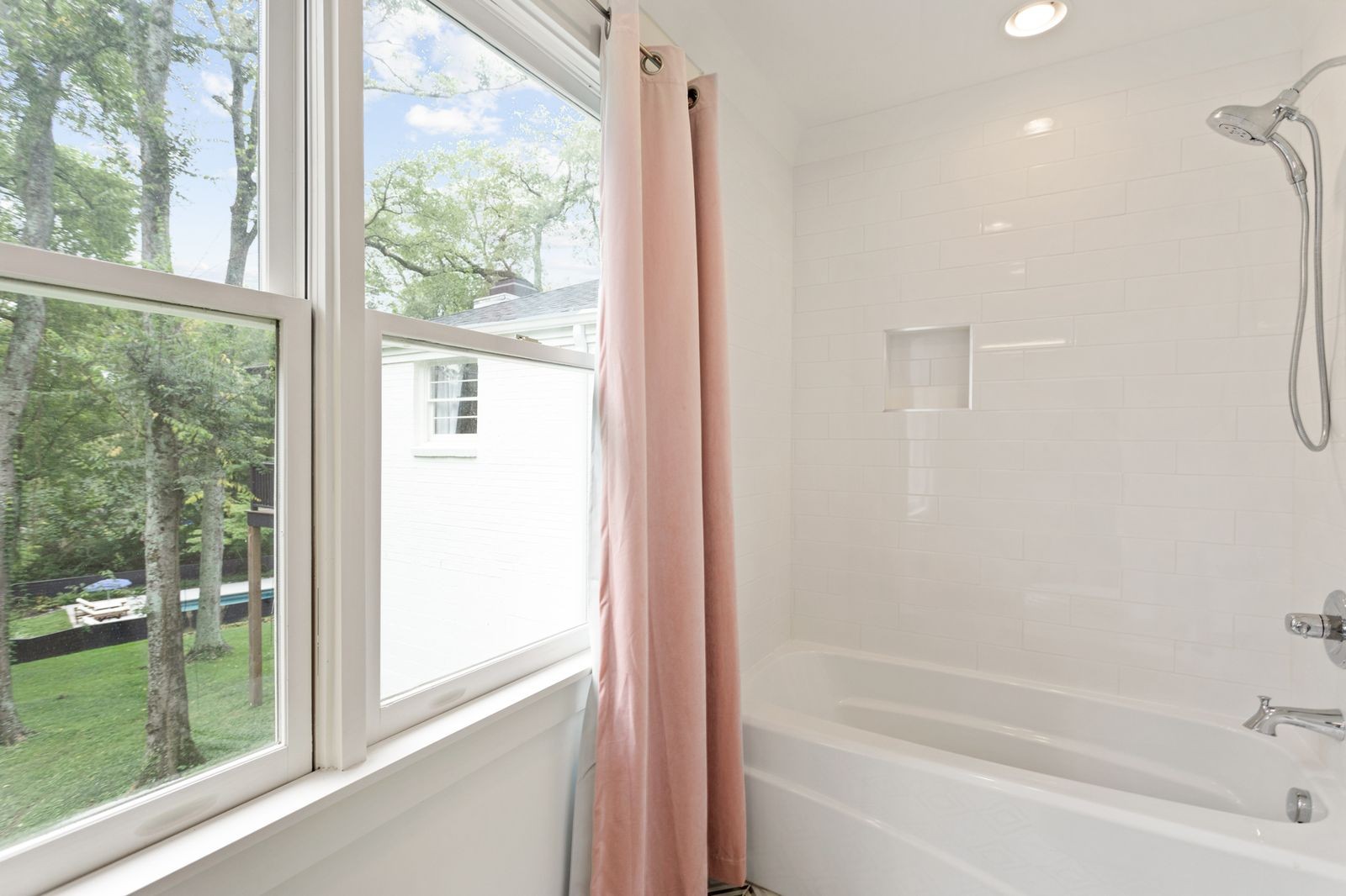 6437 Bresslyn Road Nashville, TN 37205 - Photo 26 of 47 a bathroom with a bathtub and a shower