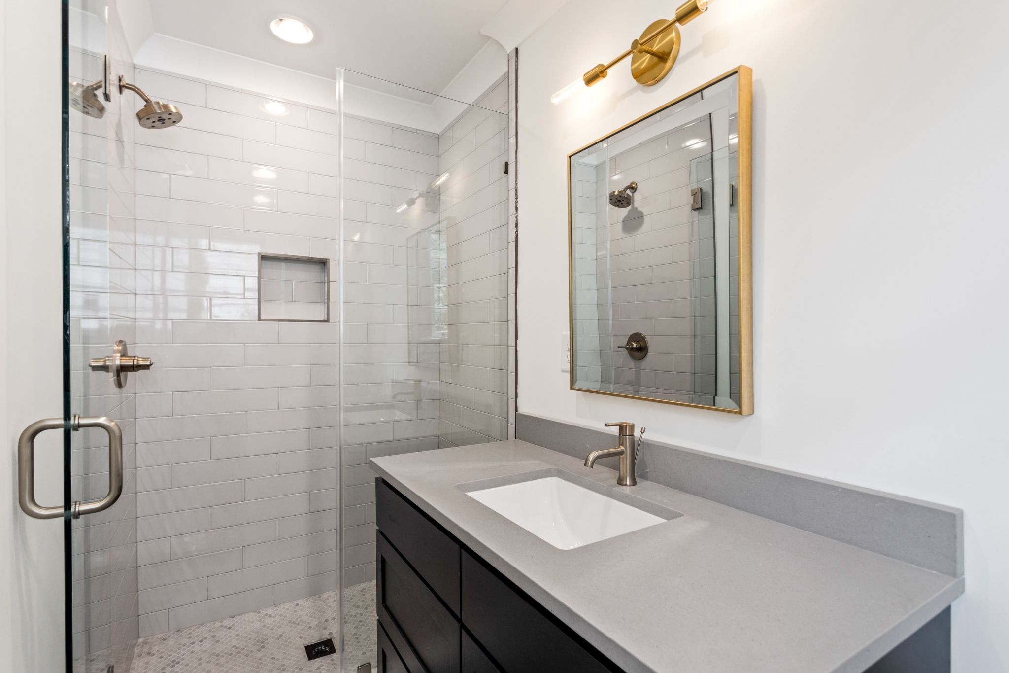 6437 Bresslyn Road Nashville, TN 37205 - Photo 28 of 47 a bathroom with a sink vanity granite shower and a mirror