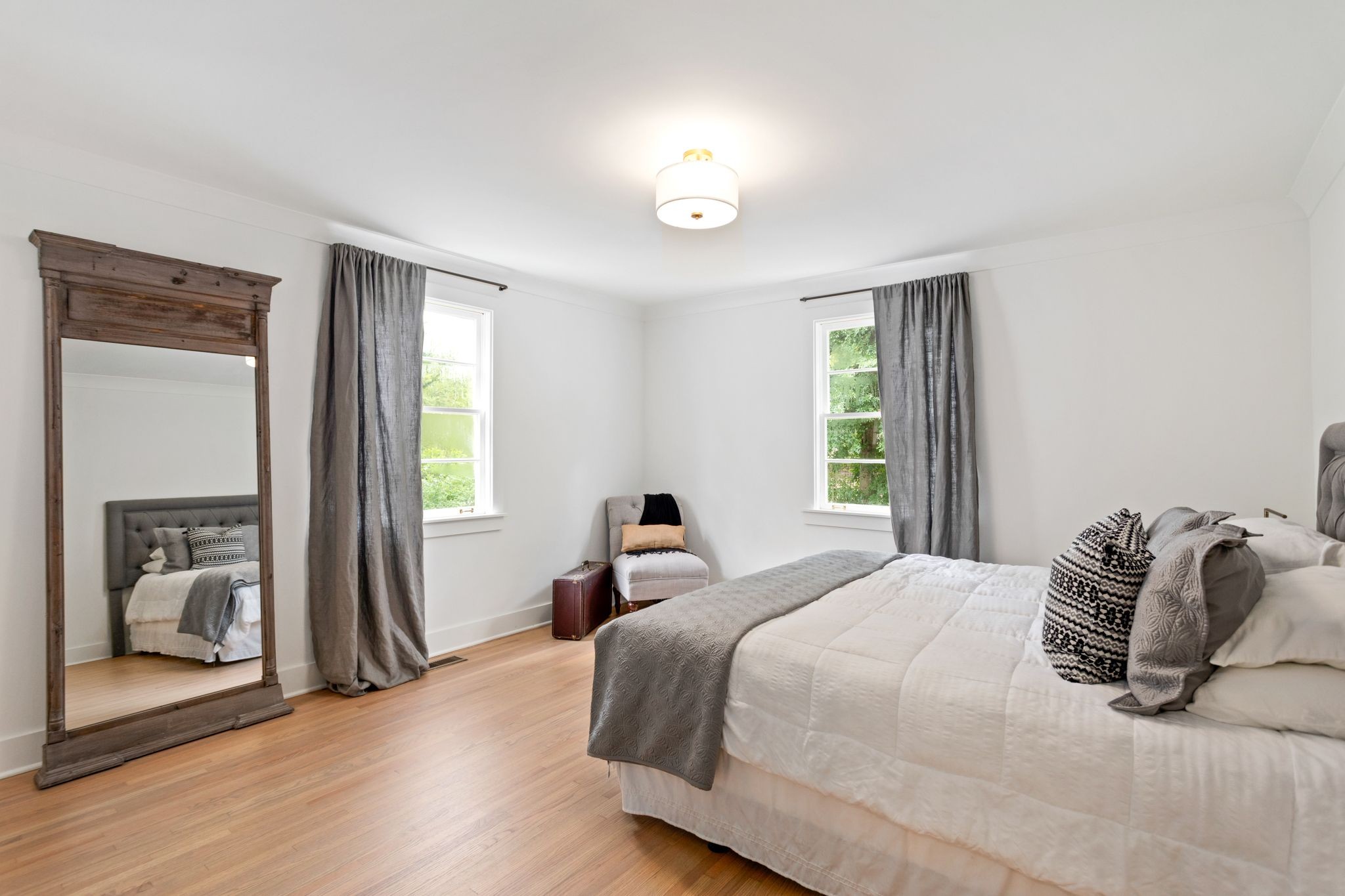 6437 Bresslyn Road Nashville, TN 37205 - Photo 29 of 47 a bedroom with a bed and a window