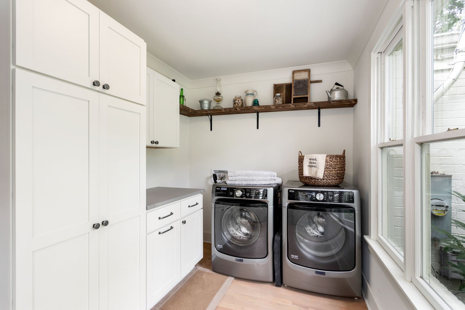 6437 Bresslyn Road Nashville, TN 37205 - Photo 31 of 47 a utility room with sink dryer and washer