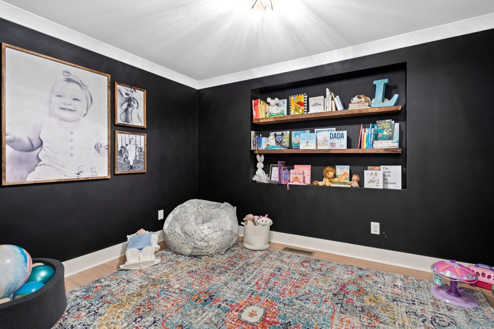 6437 Bresslyn Road Nashville, TN 37205 - Photo 33 of 47 a bedroom with a bed and a book shelf