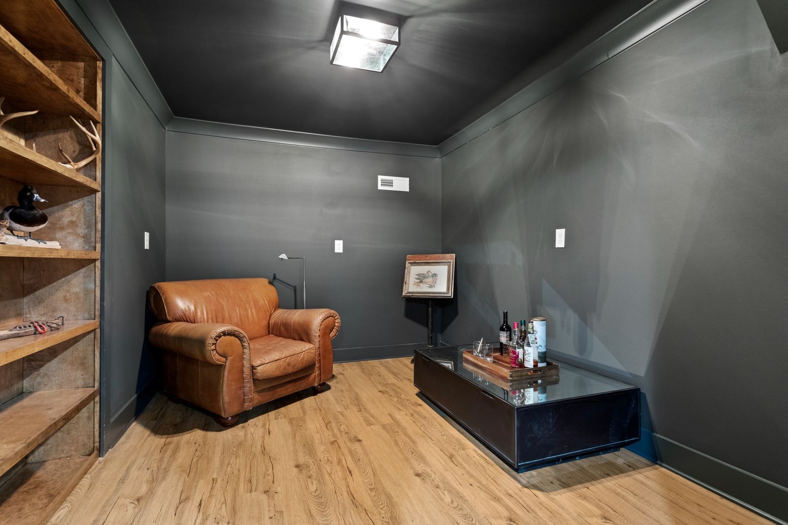 6437 Bresslyn Road Nashville, TN 37205 - Photo 34 of 47 a living room with furniture and a wooden floor