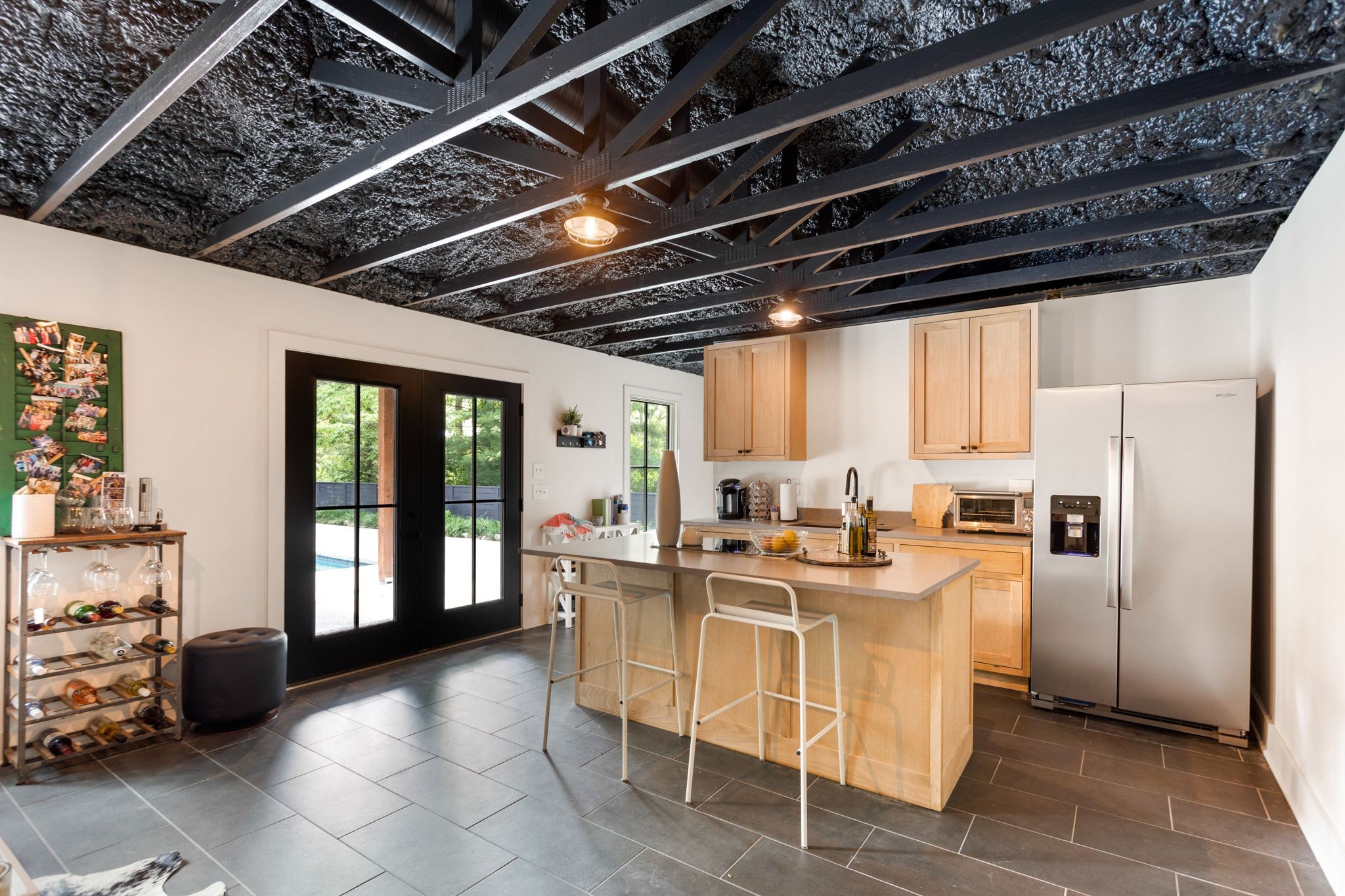 6437 Bresslyn Road Nashville, TN 37205 - Photo 45 of 47 a kitchen with stainless steel appliances granite countertop a stove a refrigerator a sink a dining table and chairs with the view of kitchen