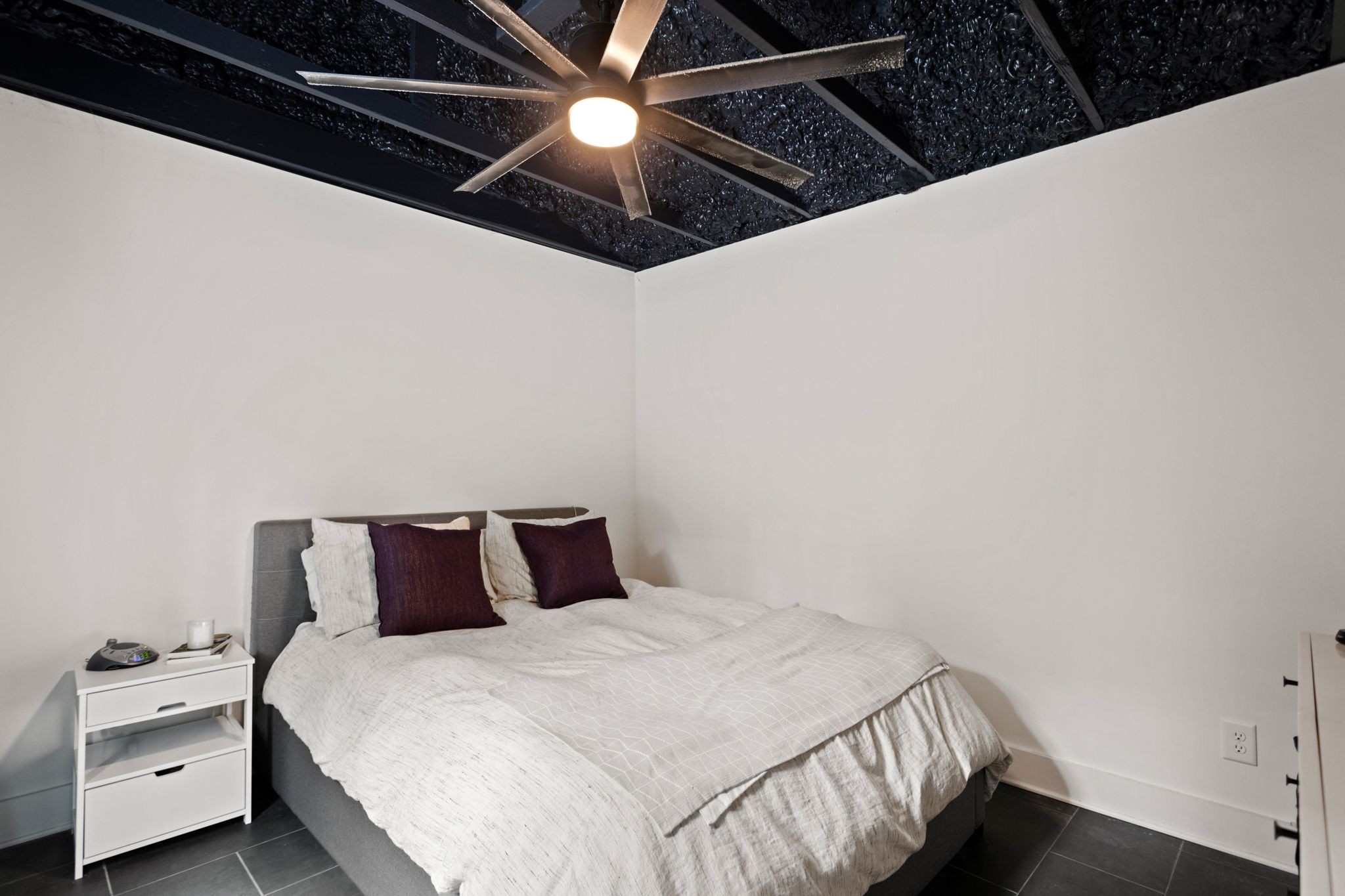 6437 Bresslyn Road Nashville, TN 37205 - Photo 46 of 47 a bedroom with a bed and a ceiling fan