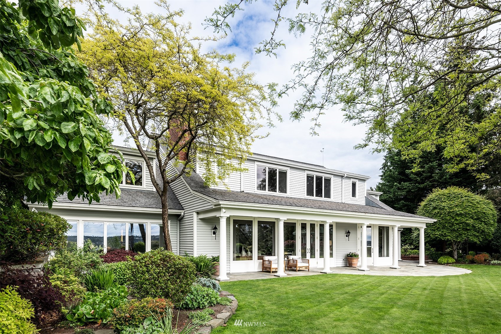 2247 Evergreen Point Road Medina, WA 98039 - Photo 1 of 1 front view of a house with a yard