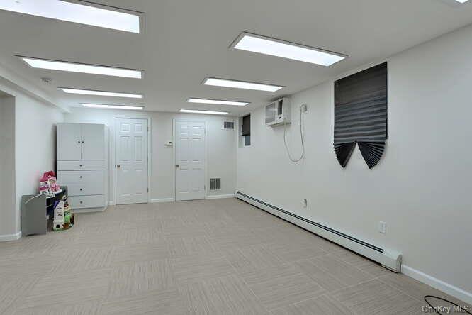 89 Spook Rock Road Suffern, NY 10901 - Photo 34 of 42 wooden floor in an empty room