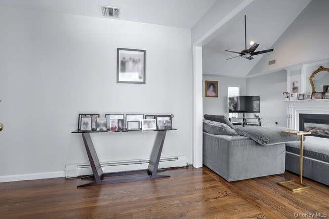 89 Spook Rock Road Suffern, NY 10901 - Photo 5 of 42 a view of a livingroom with furniture and a flat screen tv