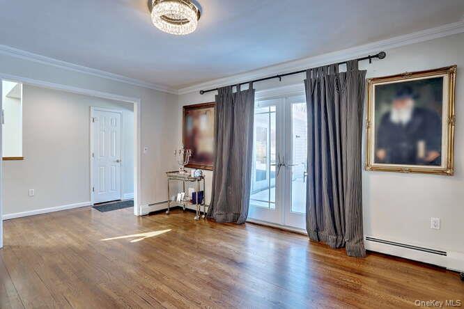 89 Spook Rock Road Suffern, NY 10901 - Photo 8 of 42 wooden floor and windows in a room