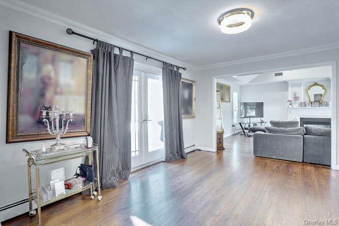 89 Spook Rock Road Suffern, NY 10901 - Photo 9 of 42 a living room with furniture and a large window