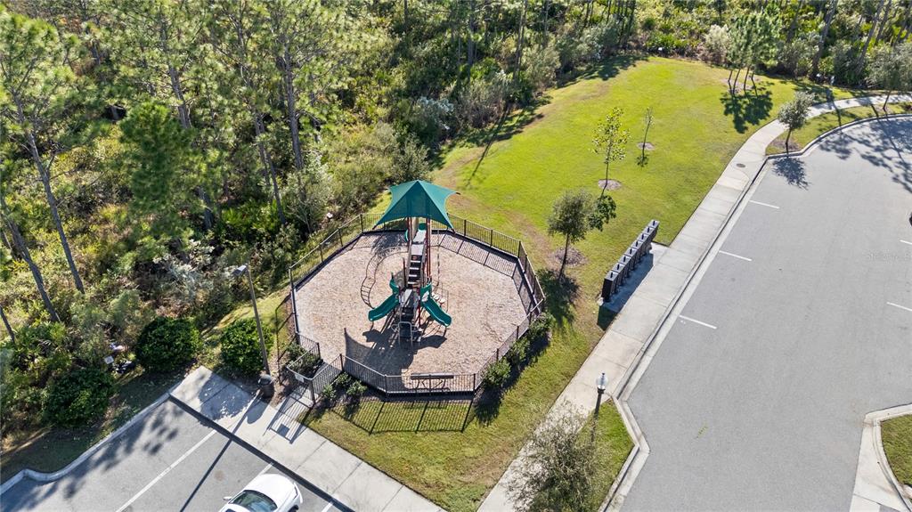 11018 Leafshore Loop Orlando, FL 32829 - Photo 21 of 24 a view of swimming pool with seating area