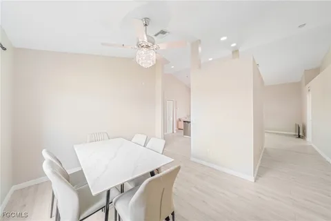 a view of a dining room with furniture