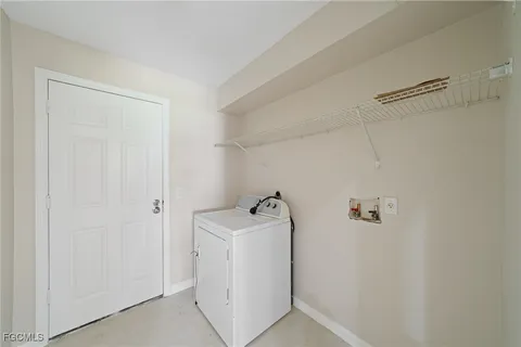 a utility room with a sink