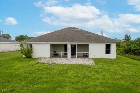a house view with a garden space