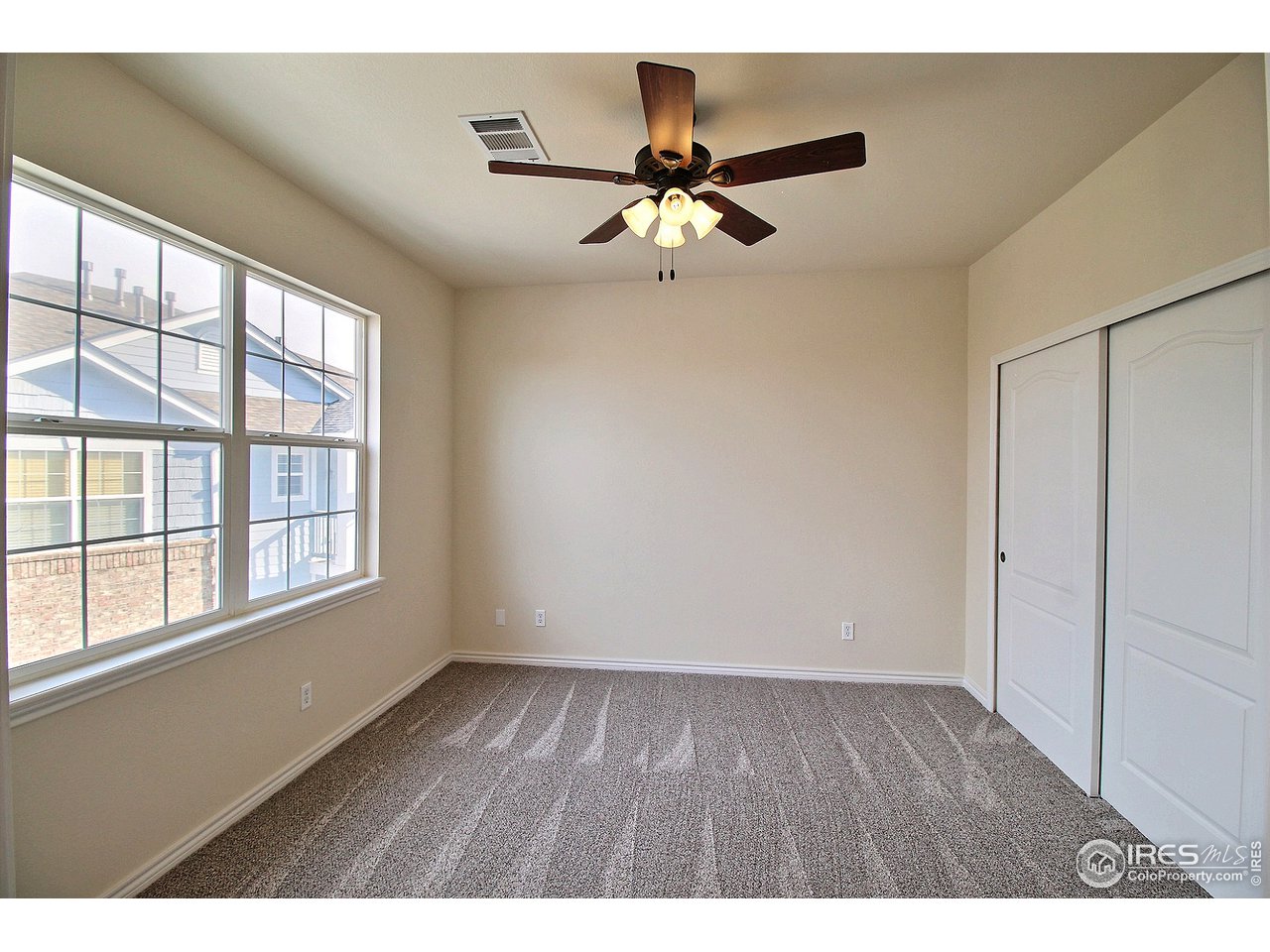 4672 West 20th Road, Unit 2324 Greeley, CO 80634 - Photo 20 of 27 2nd bedroom w/ceiling fan