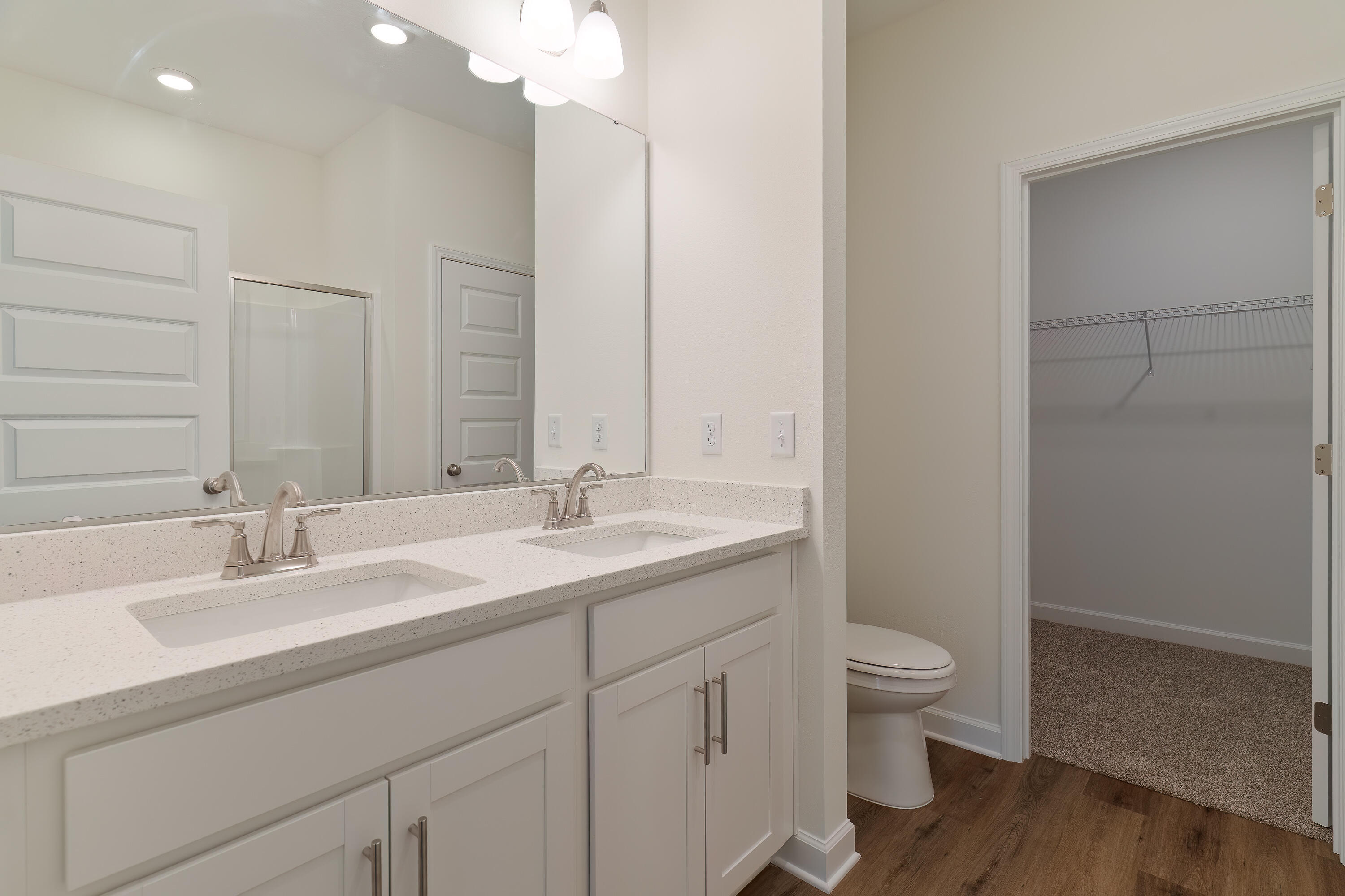6430 Kylito Circle Crestview, FL 32539 - Photo 12 of 18 a bathroom with a toilet a sink and mirror
