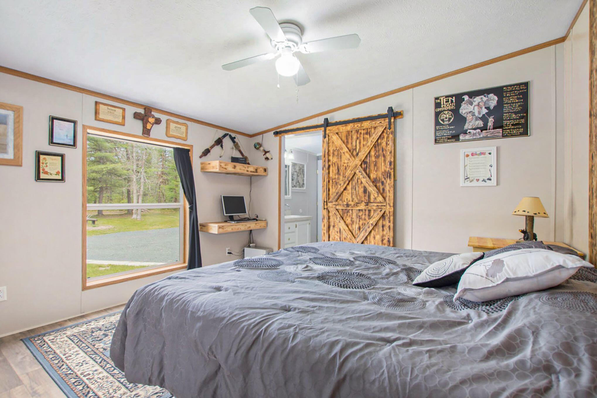 1718 Marzinski Road Manistee, MI 49660 - Photo 8 of 27 Master Bedroom
