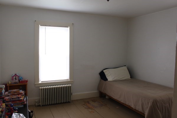 13 Florence Road Easthampton, MA 01027 - Photo 23 of 33 a bedroom with a bed and window