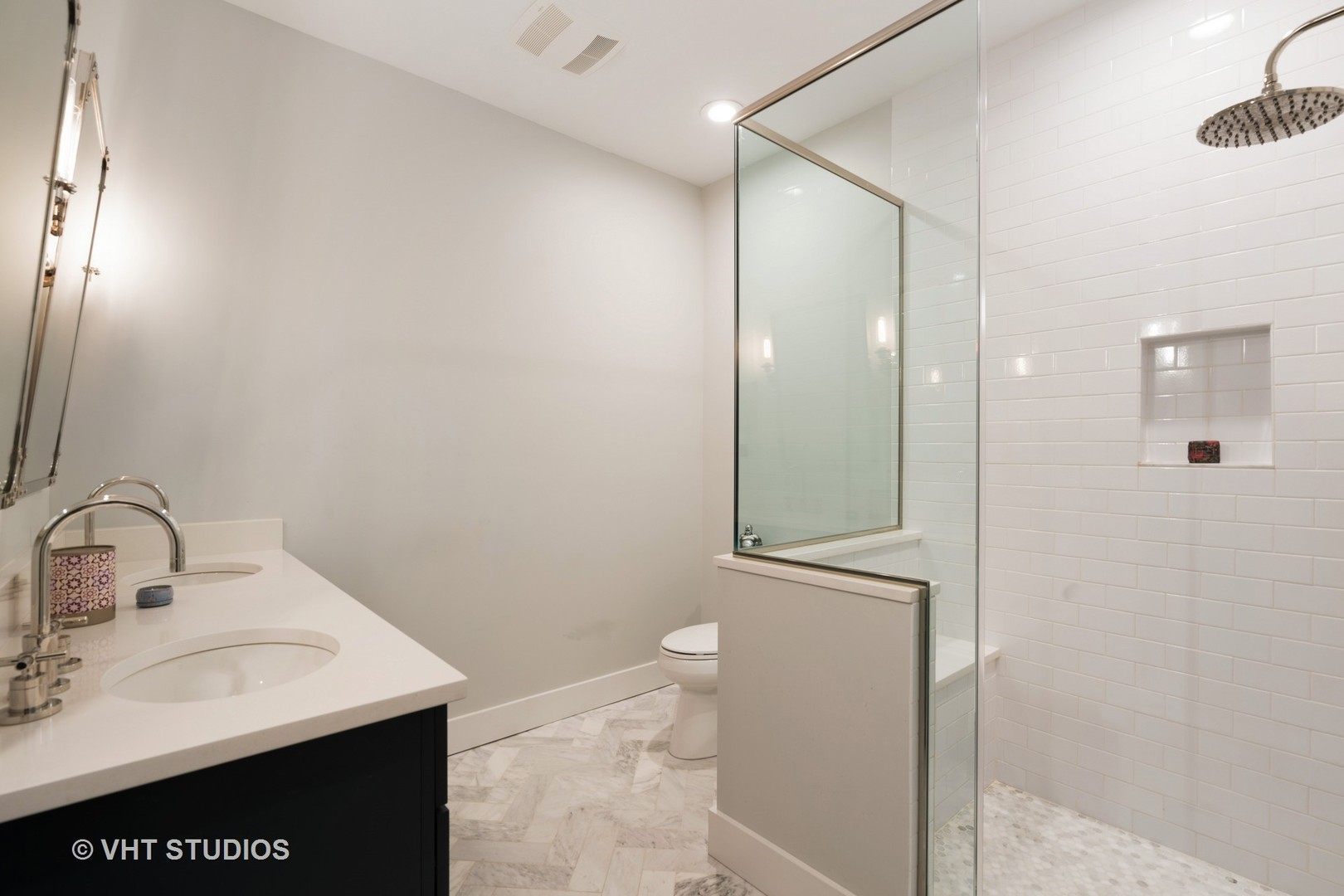 1048 West Fulton Market, Unit 3 Chicago, IL 60607 - Photo 11 of 16 a bathroom with a sink a toilet and shower