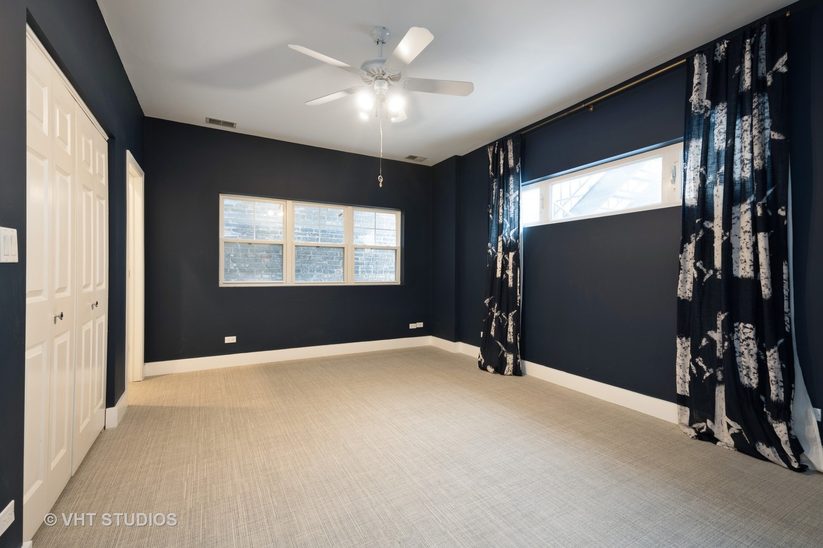 1048 West Fulton Market, Unit 3 Chicago, IL 60607 - Photo 8 of 16 a view of an empty room with a window