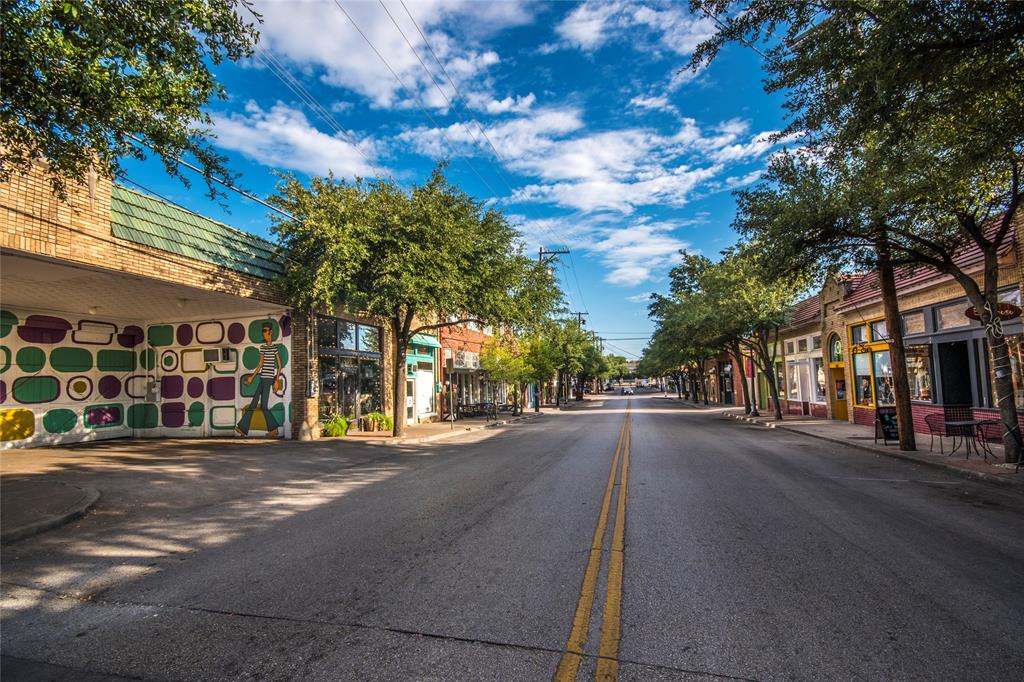 927 South Franklin Street Dallas, TX 75211 - Photo 15 of 22 a city street lined with buildings and trees