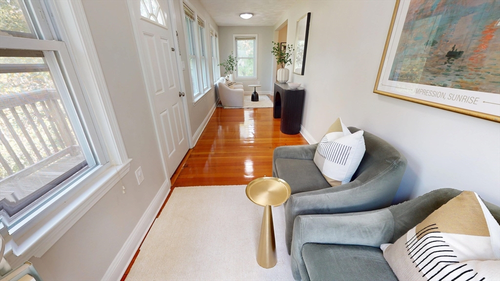 7 Penny Hill Road Melrose, MA 02176 - Photo 13 of 36 a hallway with furniture and a large window